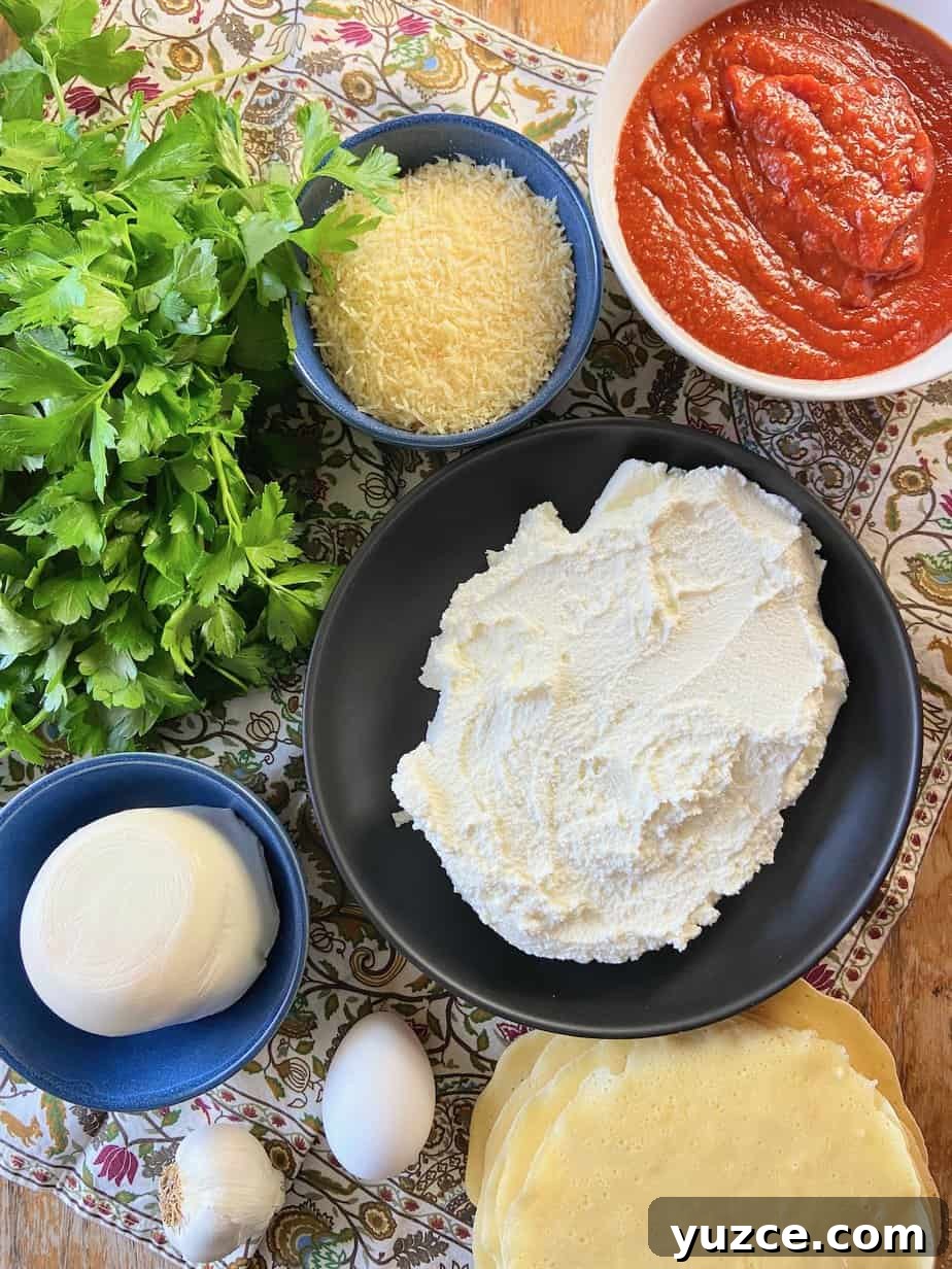 Three-Cheese Manicotti Crepes: Stuffed Italian Recipe 3 Ingredients for manicotti crepes on wooden table.