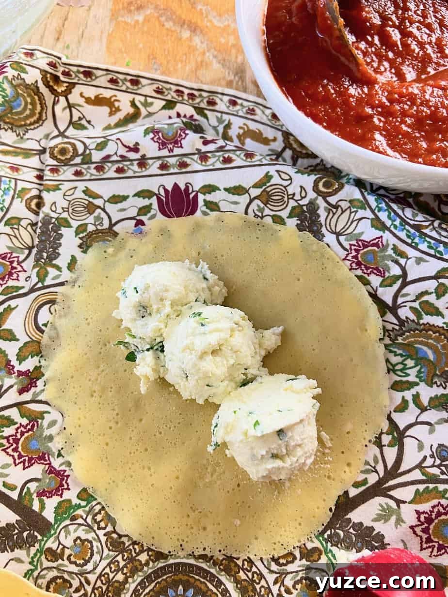 Three-Cheese Manicotti Crepes: Stuffed Italian Recipe 6 Manicotti crepe with three tablespoons of cheese filling.
