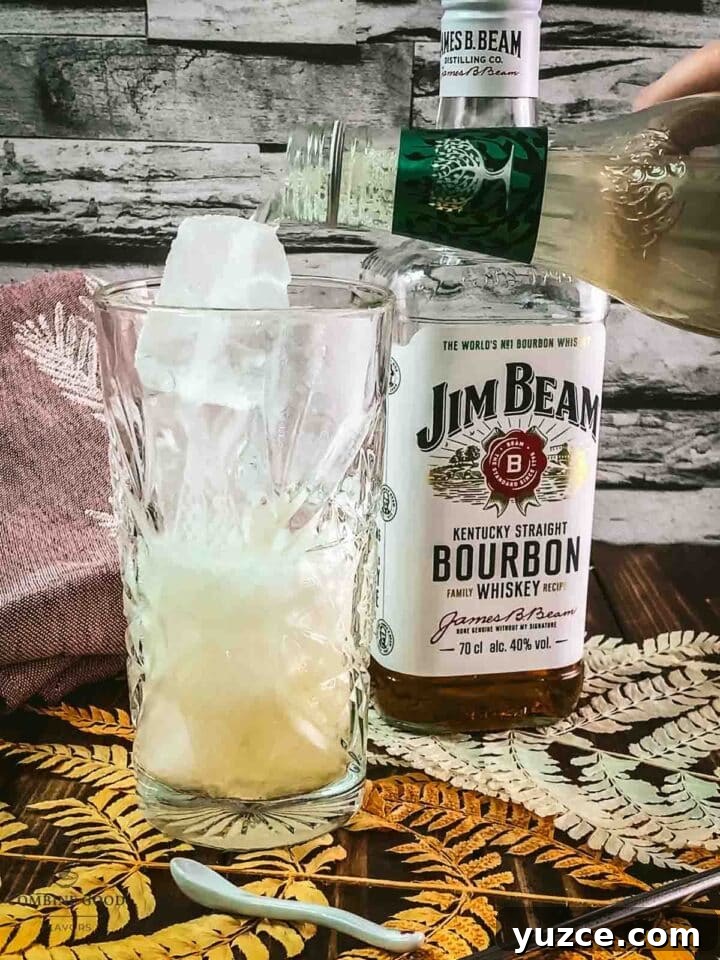 Classic Bourbon Highball Recipe: Refreshing Whiskey Cocktail Guide 6 Top with ginger beer.