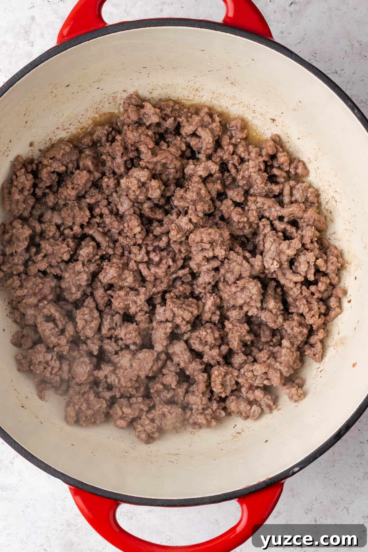 Spiced Pumpkin Chili with Turkey and Beans 3 Ground beef browned in a large pot.