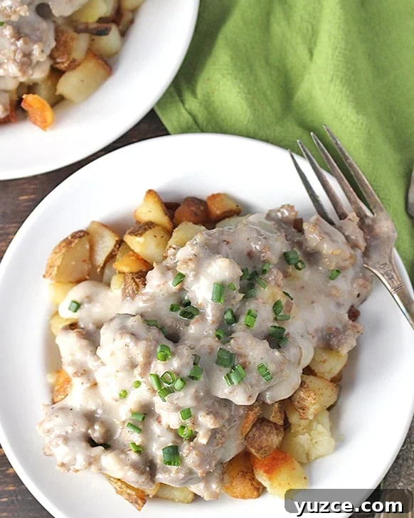 This Paleo Whole30 Sausage Gravy is so easy to make and packed with flavor. Creamy, thick, and so delicious! A classic made gluten free and dairy free and just as good! Paleo Whole30 Sausage Gravy