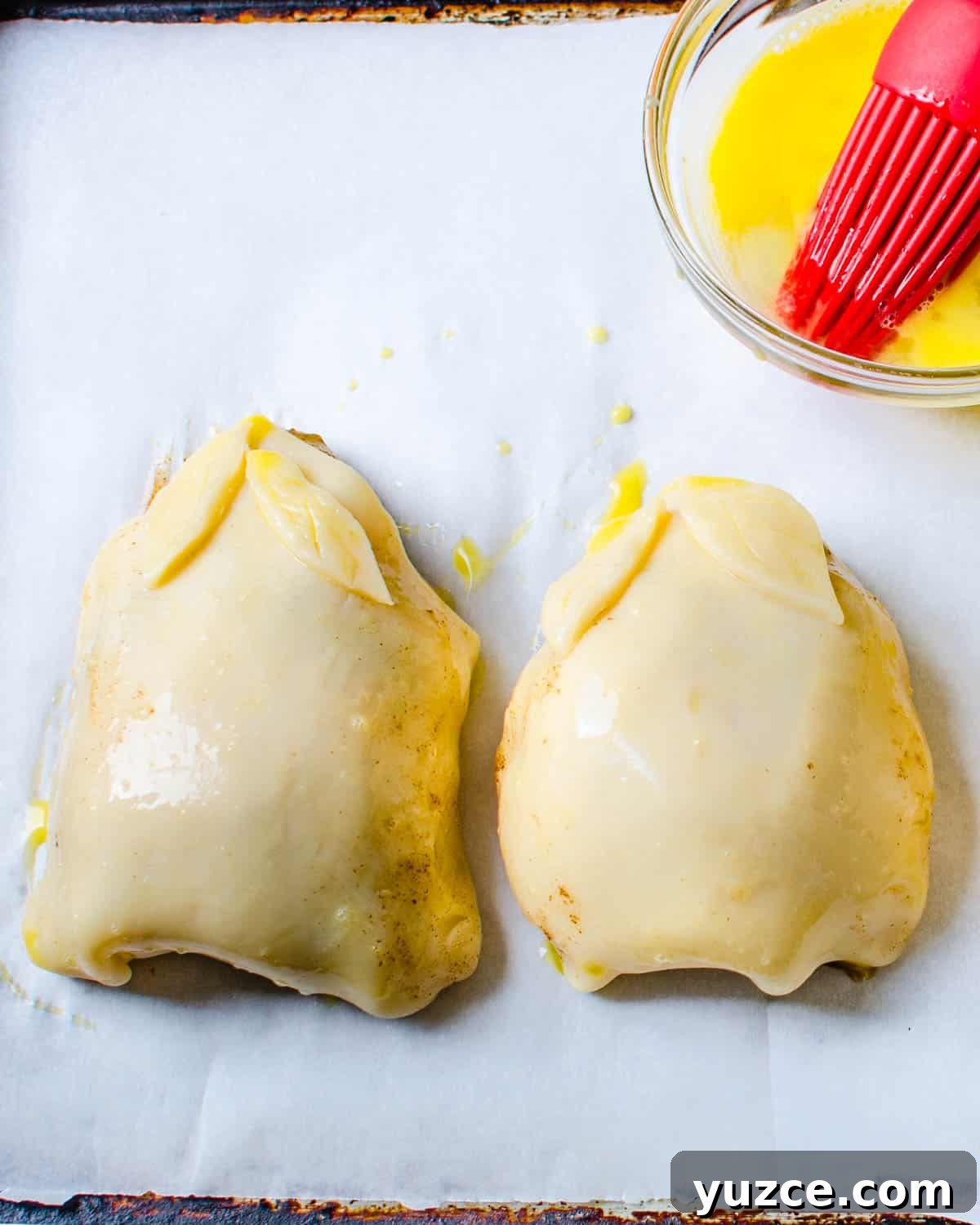 Warm Autumn-Spiced Baked Pears with Maple Glaze 5 Brushing the pear desserts with egg wash.