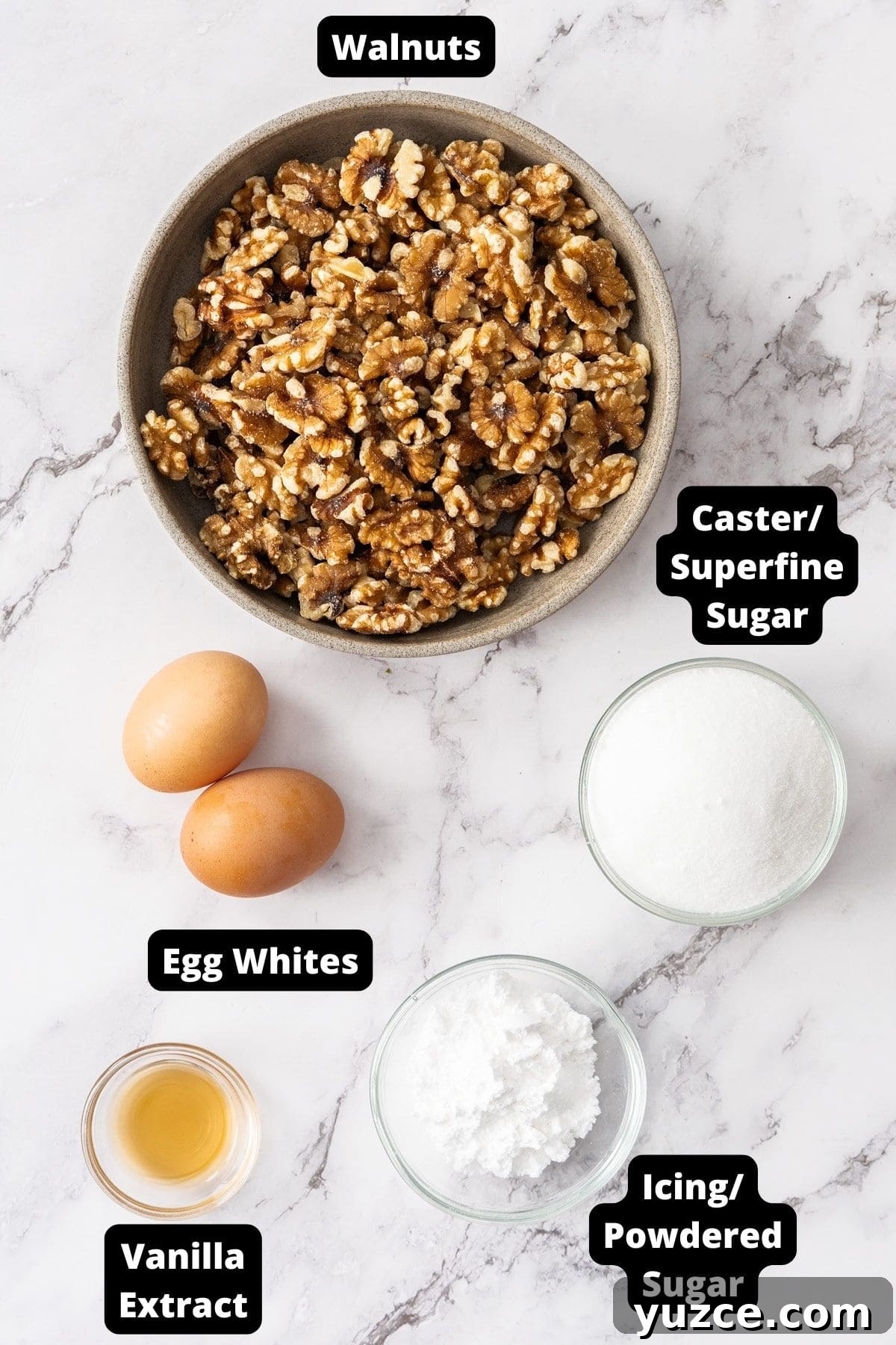 Gluten-Free Walnut Cookie Recipe — Crunchy Homemade Treat 3 Ingredients in this recipe on a white marble background.