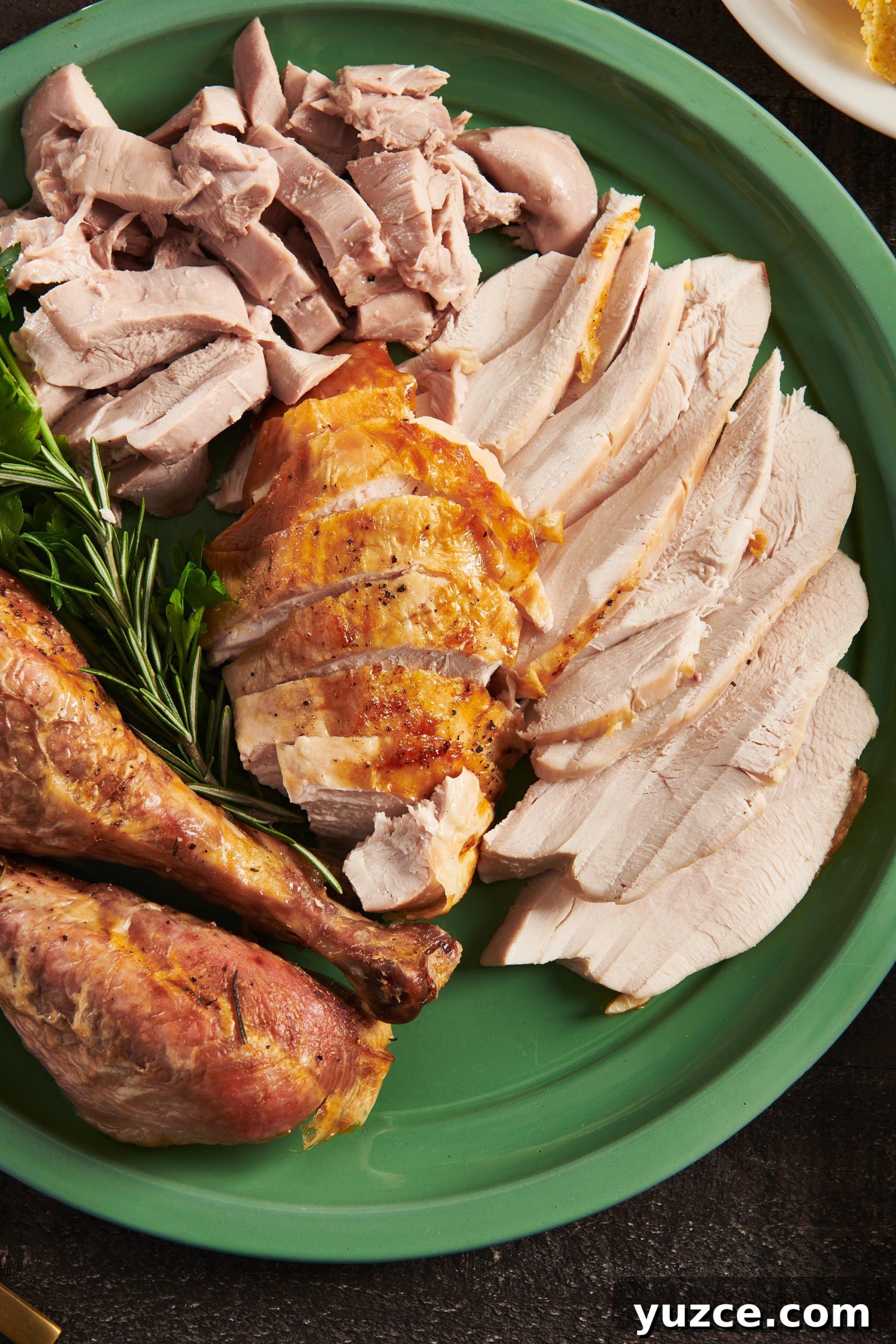 Perfect Turkey Carving Guide: Step-by-Step Tips for Juicy Slices 12 Sliced roasted turkey on serving platter.