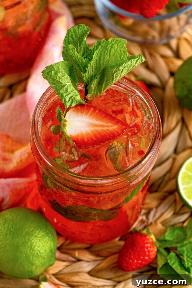 Strawberry Vodka Smash: Refreshing Summer Cocktail Recipe 3 looking down into a strawberry vodka smash cocktail