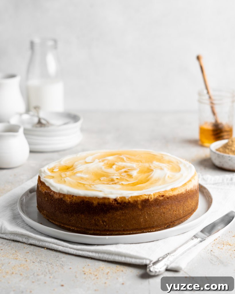 Salted Honey Cheesecake Recipe with Crispy Graham Crust 3 Creamy Salted Honey Cheesecake has a graham cracker crust and a sour cream topping. Drizzled with additional salted honey