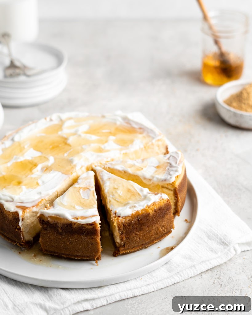 Salted Honey Cheesecake Recipe with Crispy Graham Crust 4 Creamy Salted Honey Cheesecake has a graham cracker crust and a sour cream topping. Drizzled with additional salted honey