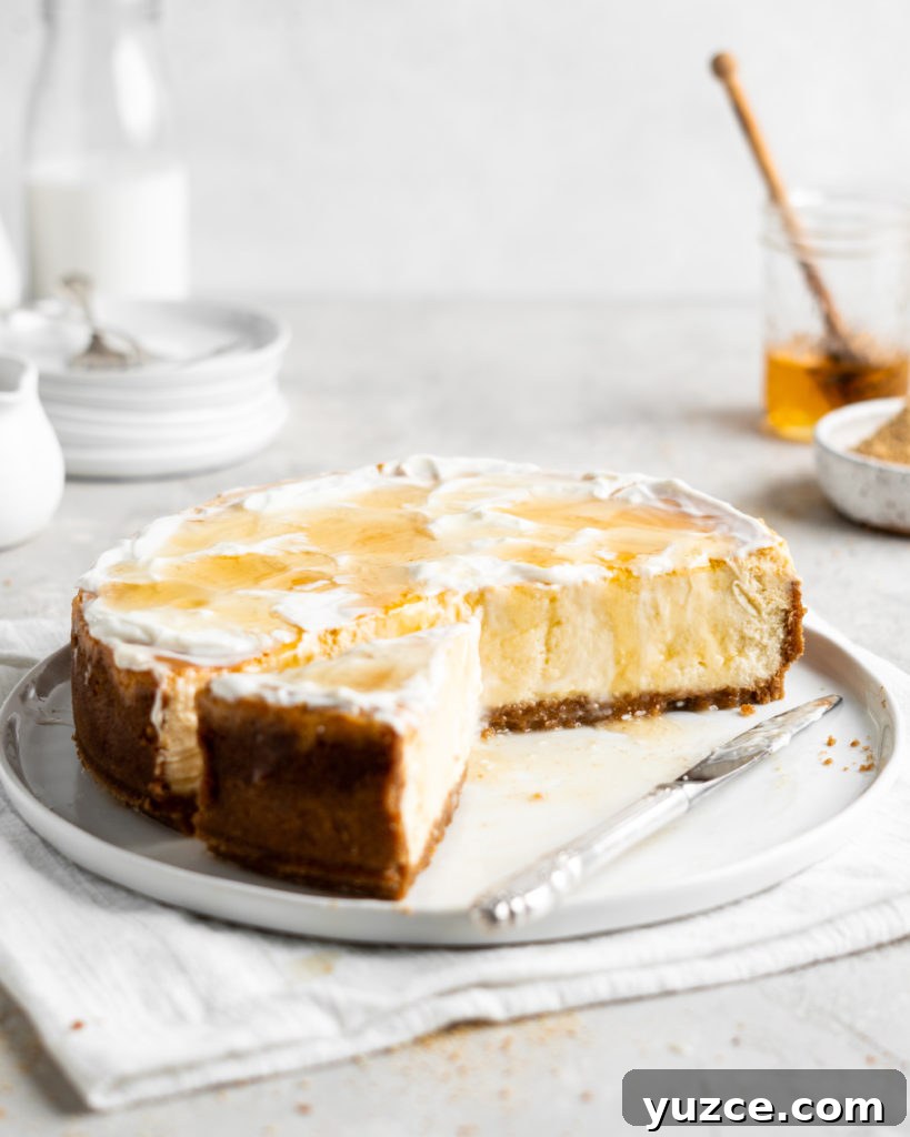 Salted Honey Cheesecake Recipe with Crispy Graham Crust 6 Creamy Salted Honey Cheesecake has a graham cracker crust and a sour cream topping. Drizzled with additional salted honey