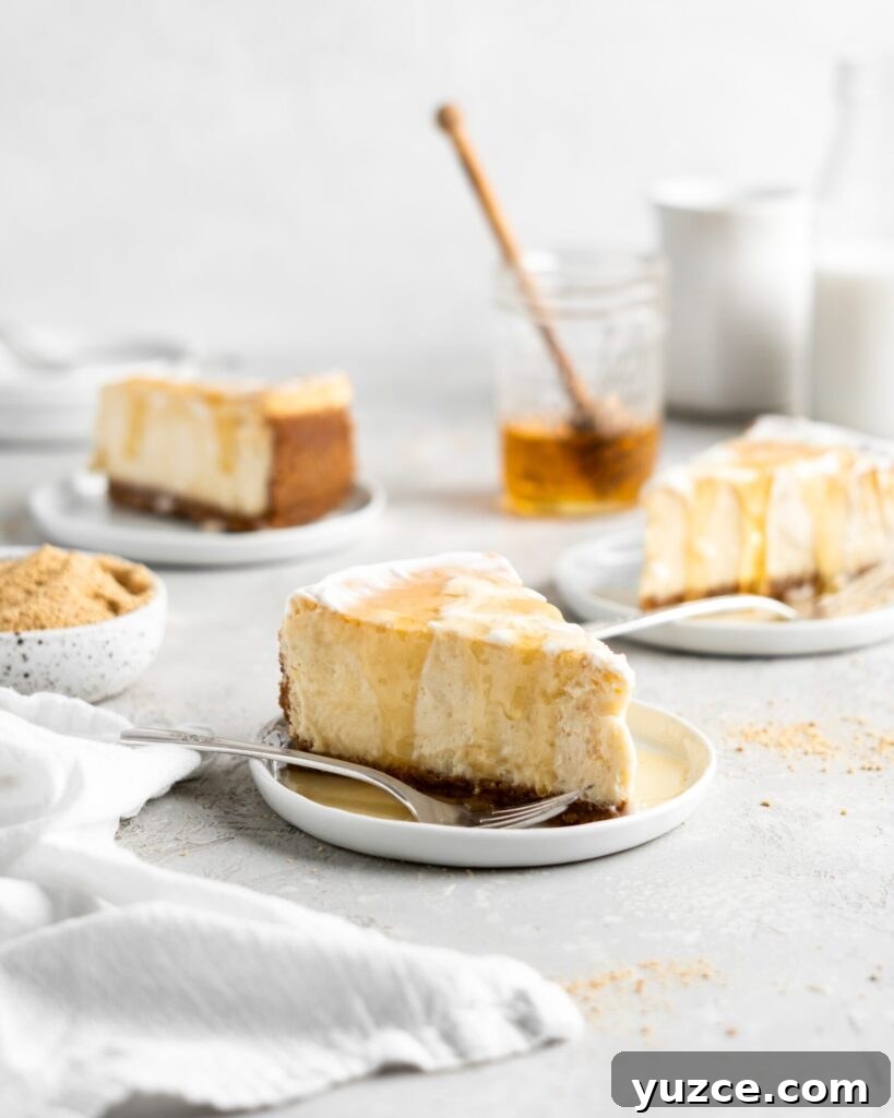 Salted Honey Cheesecake Recipe with Crispy Graham Crust 7 Creamy Salted Honey Cheesecake has a graham cracker crust and a sour cream topping. Drizzled with additional salted honey