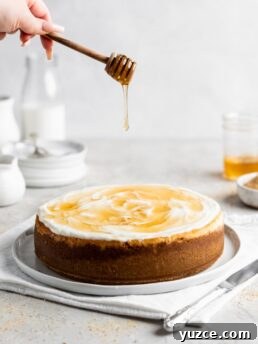 Salted Honey Cheesecake Recipe with Crispy Graham Crust 8 Creamy Salted Honey Cheesecake has a graham cracker crust and a sour cream topping. Drizzled with additional salted honey