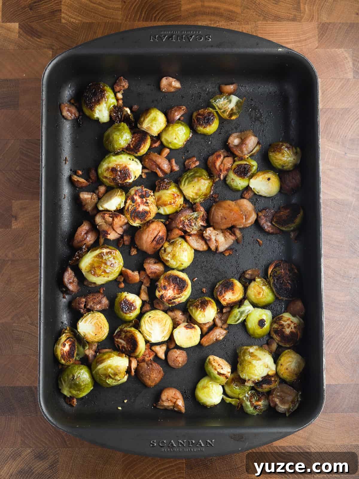 Smoky Roasted Brussels Sprouts with Chestnuts (Vegan) 6 Photo of sprouts and chestnuts in the roasting tin after roasting.