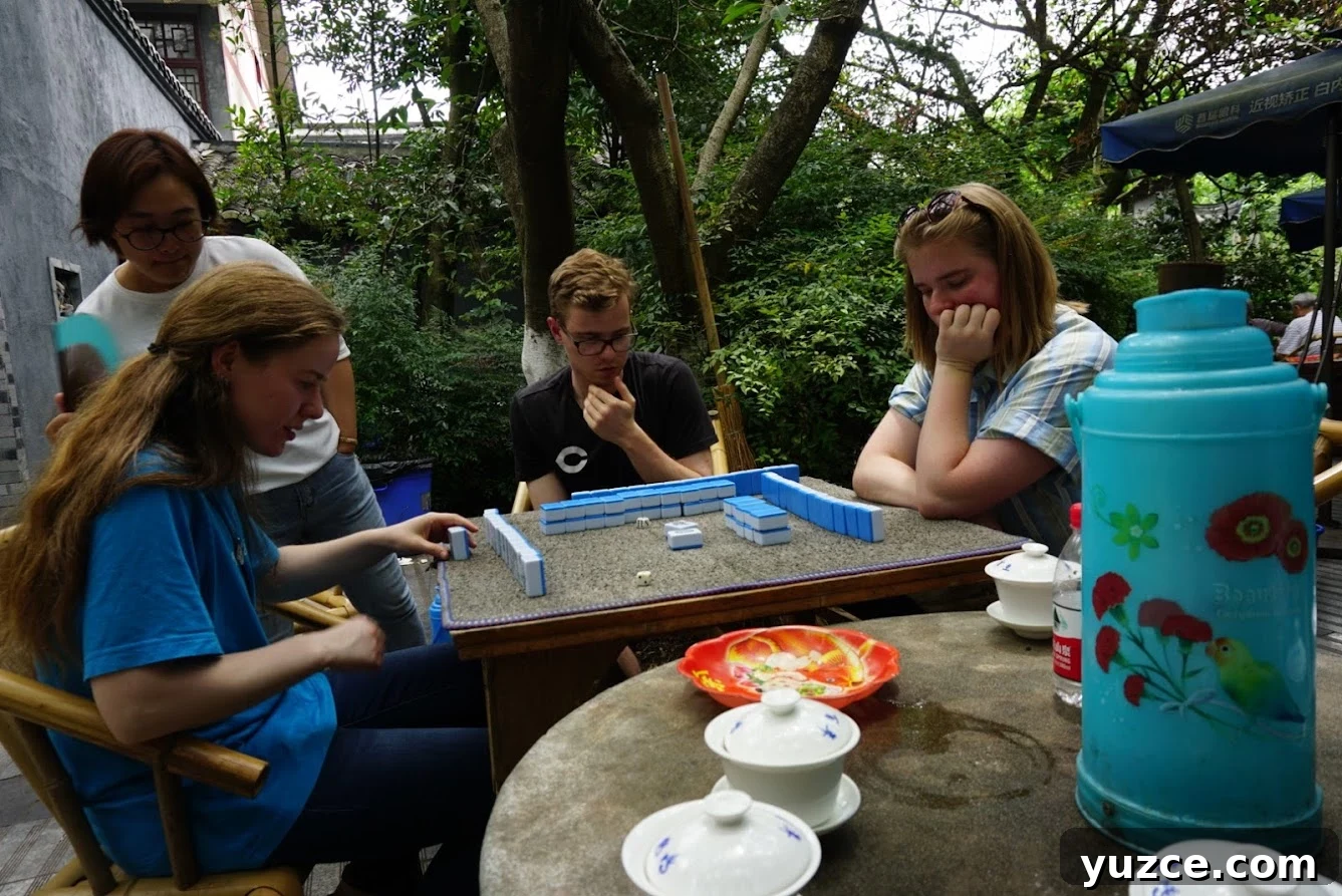 Embrace Hygge Year-Round: Cozy Living Beyond Winter 4 Playing mahjong and drinking tea in a park.