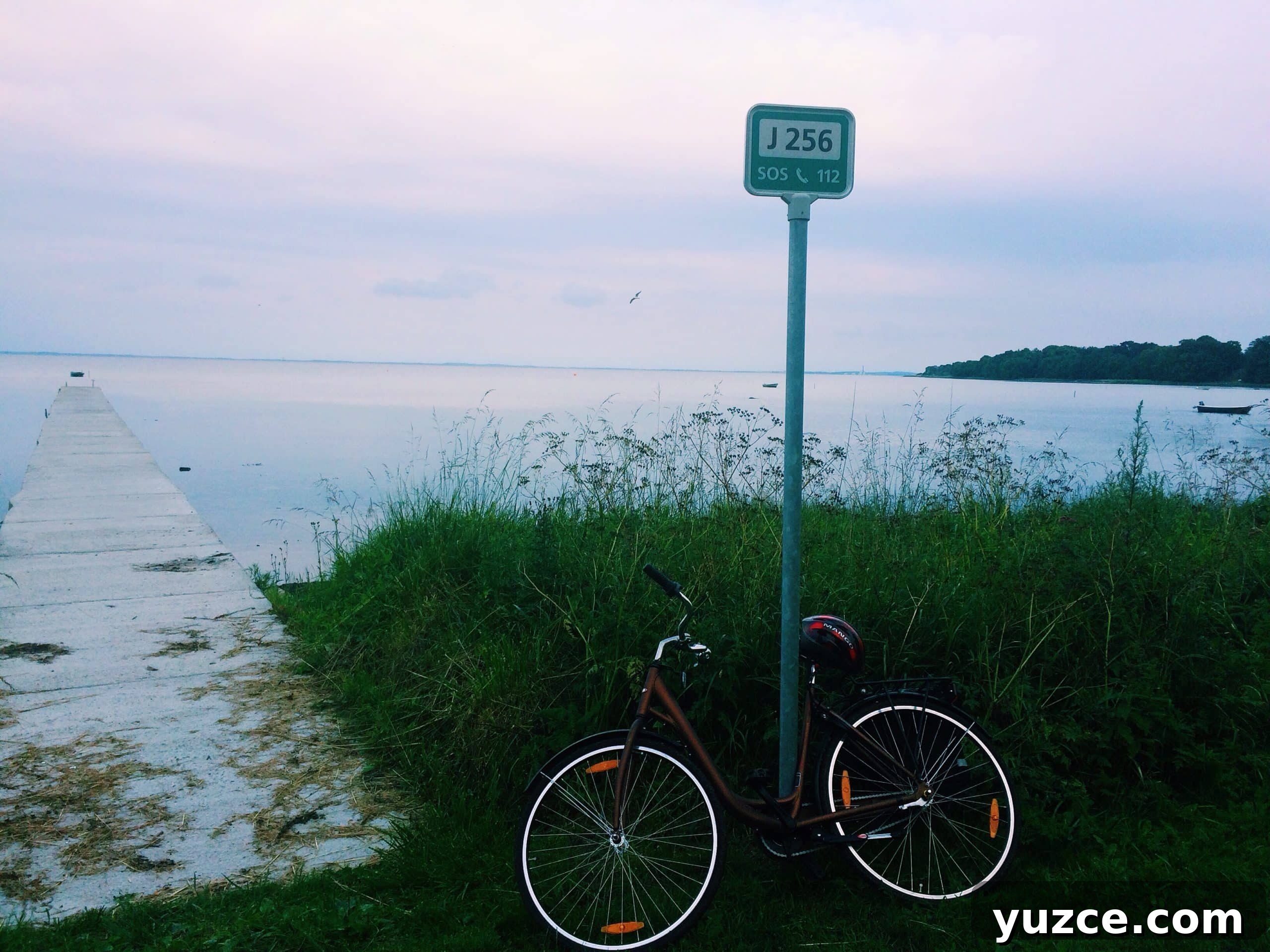 Embrace Hygge Year-Round: Cozy Living Beyond Winter 5 A bike by the beach in denmark.