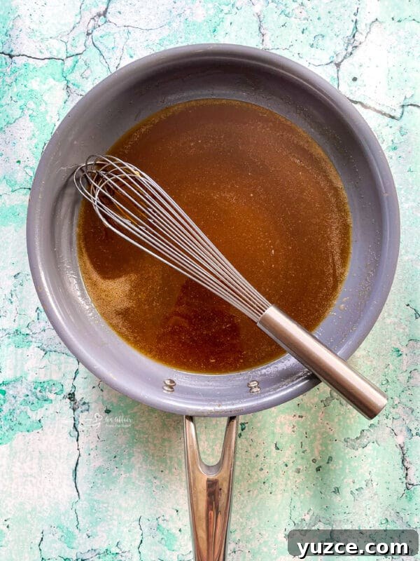Homemade Pineapple Upside-Down Cake Recipe 11 Pineapple arranged in skillet