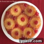 Homemade Pineapple Upside-Down Cake Recipe 16 Overhead of From Scratch Pineapple Upside Down Cake on a white plate