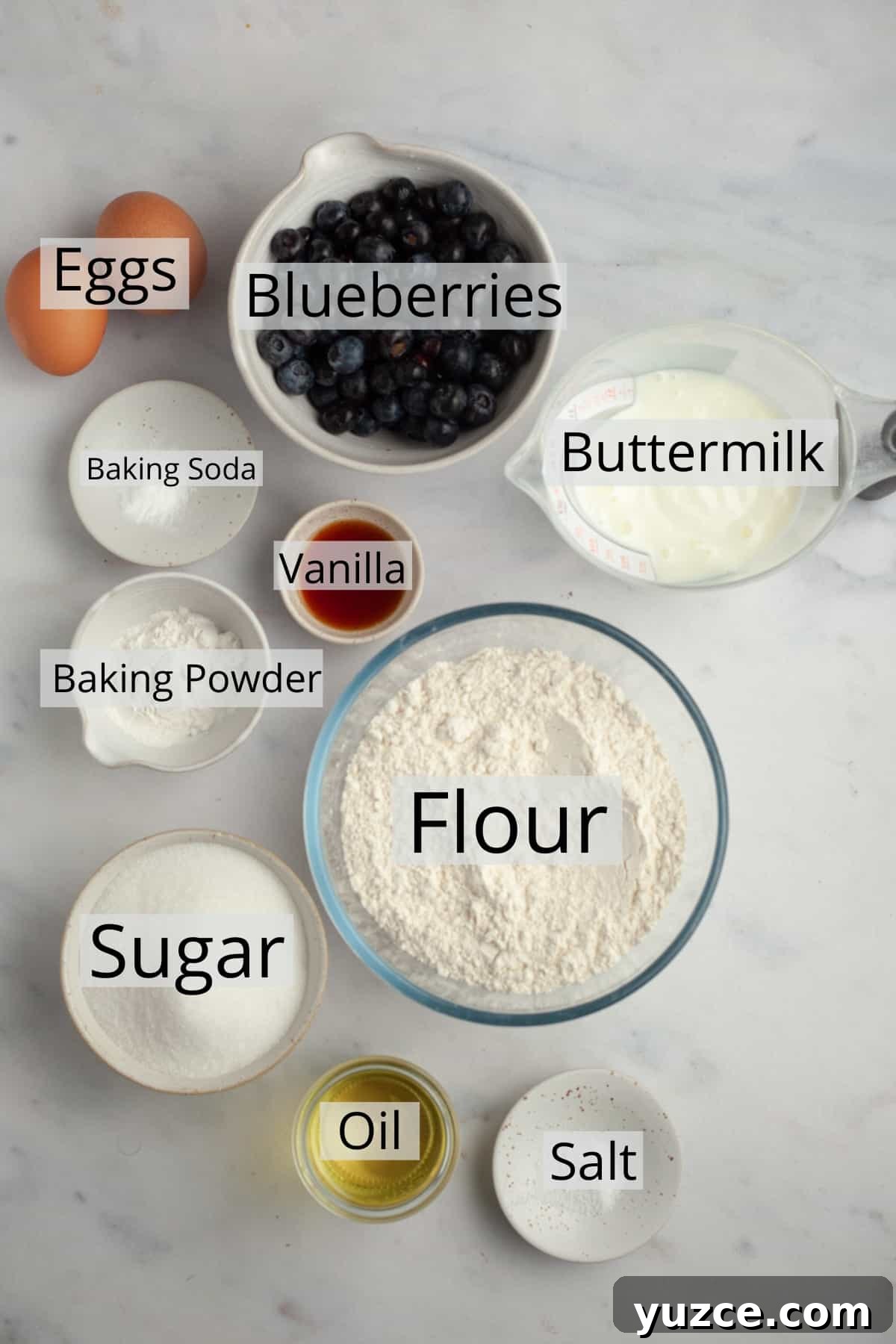 Bakery-Style Buttermilk Blueberry Muffins Recipe 3 All the ingredients needed to make blueberry muffins, weighed out into small bowls.