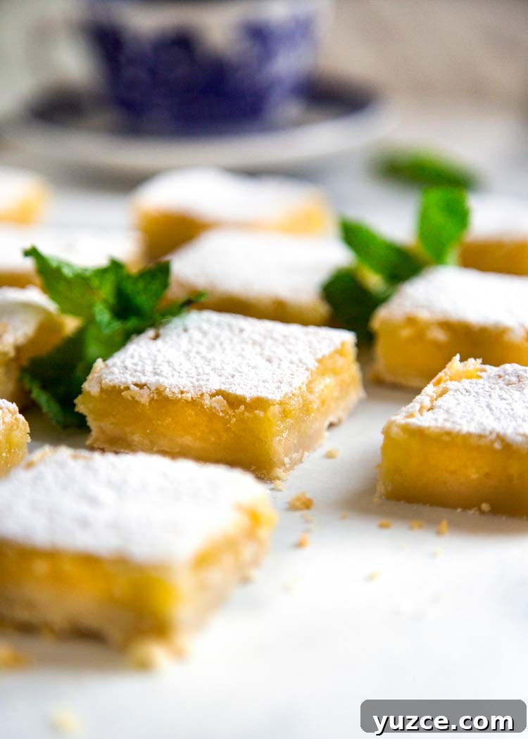 Shortbread Lemon Bars Shortbread Lemon Bars being sliced