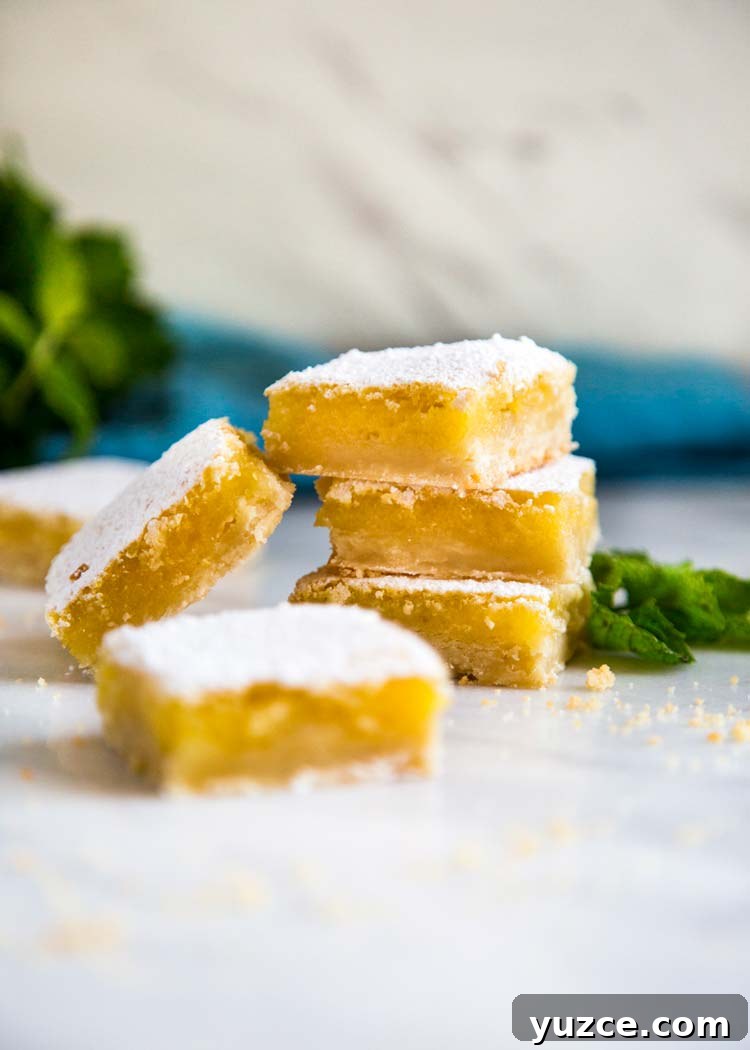 Shortbread Lemon Bars Shortbread Lemon Bars served on a plate