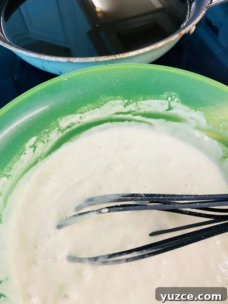 Sausage Pancake Corn Dogs Recipe: Crispy Breakfast on a Stick 5 pancake batter and oil in a skillet