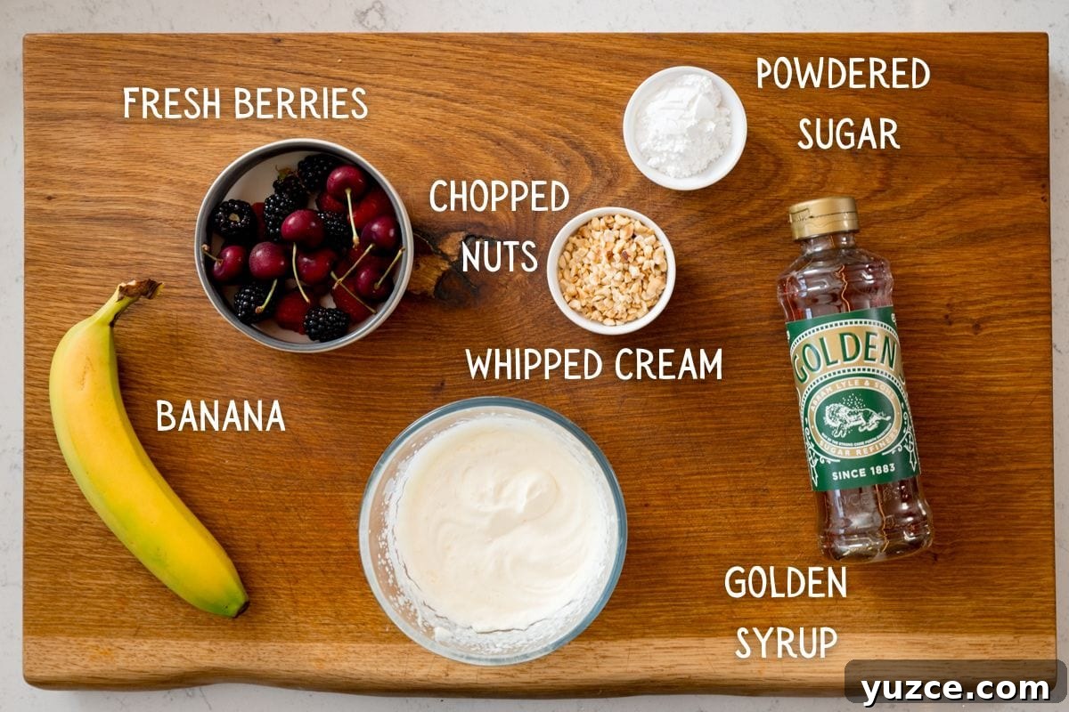 A wooden board displaying ingredients for French Toast toppings: a banana, a bowl of fresh berries, chopped nuts, whipped cream, icing sugar, and golden syrup, all labelled.