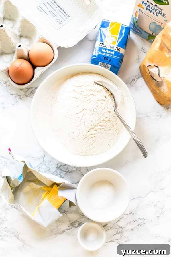 Crispy Air Fryer Dinner Rolls Recipe for Soft, Fluffy Buns 3 Ingredients laid out for air fryer dinner rolls.