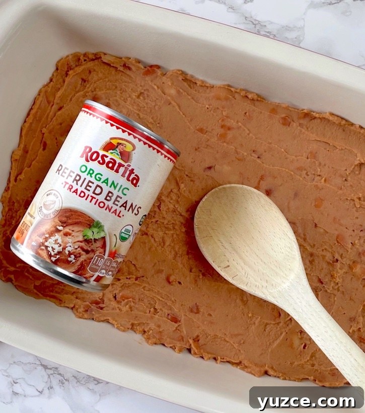Quick Frozen Taquito Enchiladas: 30-Minute Weeknight Recipe 5 How to make lazy enchiladas with refried beans!