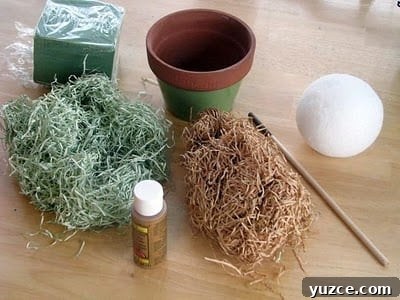 Spring Topiary Ideas to Refresh Your Garden Today 3 craft grass and paint and flower pot and styrofoam ball
