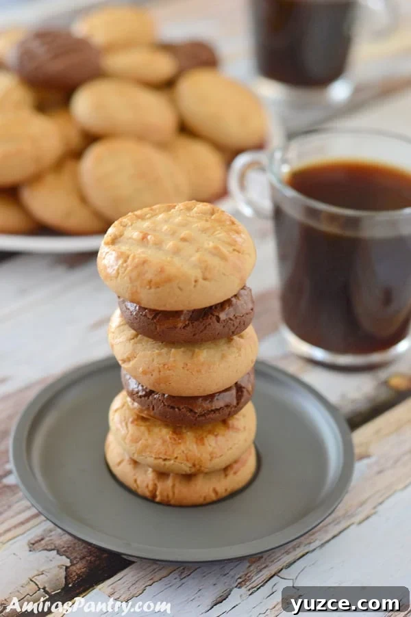 Afternoon Tea Cookies: Classic Recipes for Elegant Tea Time 2 A close up of cookies on a plate nd a cup of coffee