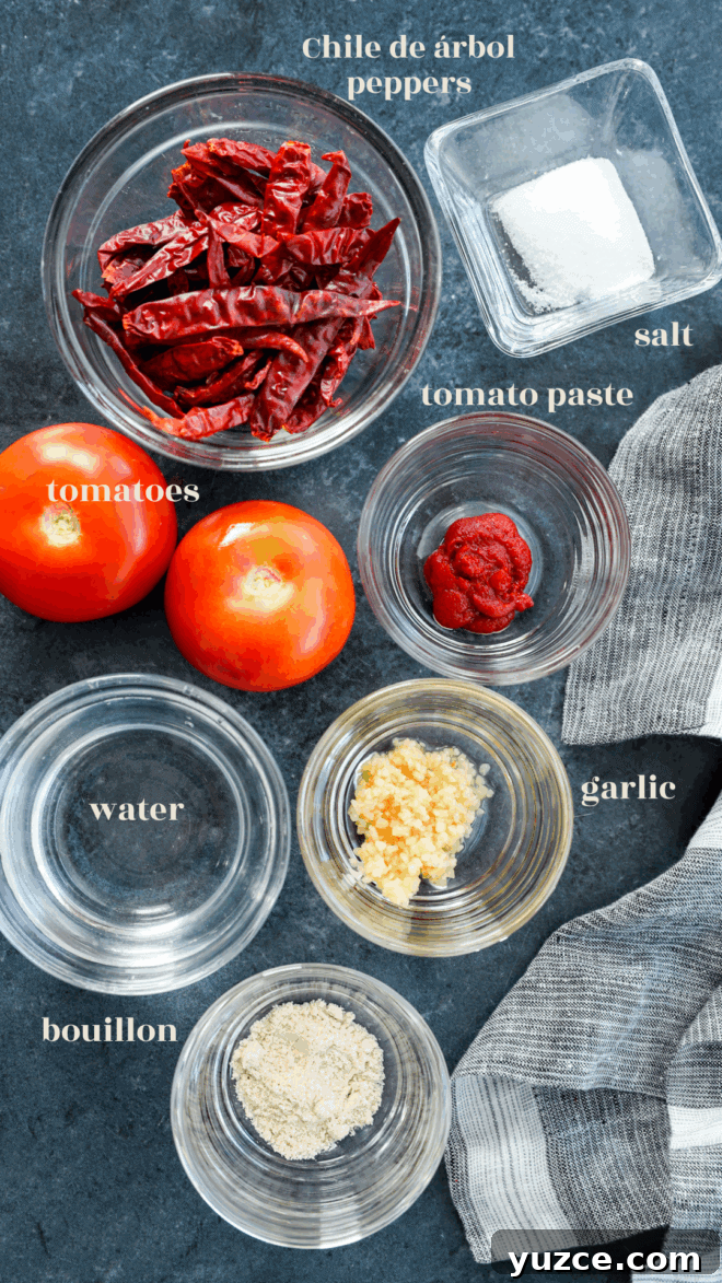 chile de arbol salsa ingredients in bowls with text labels