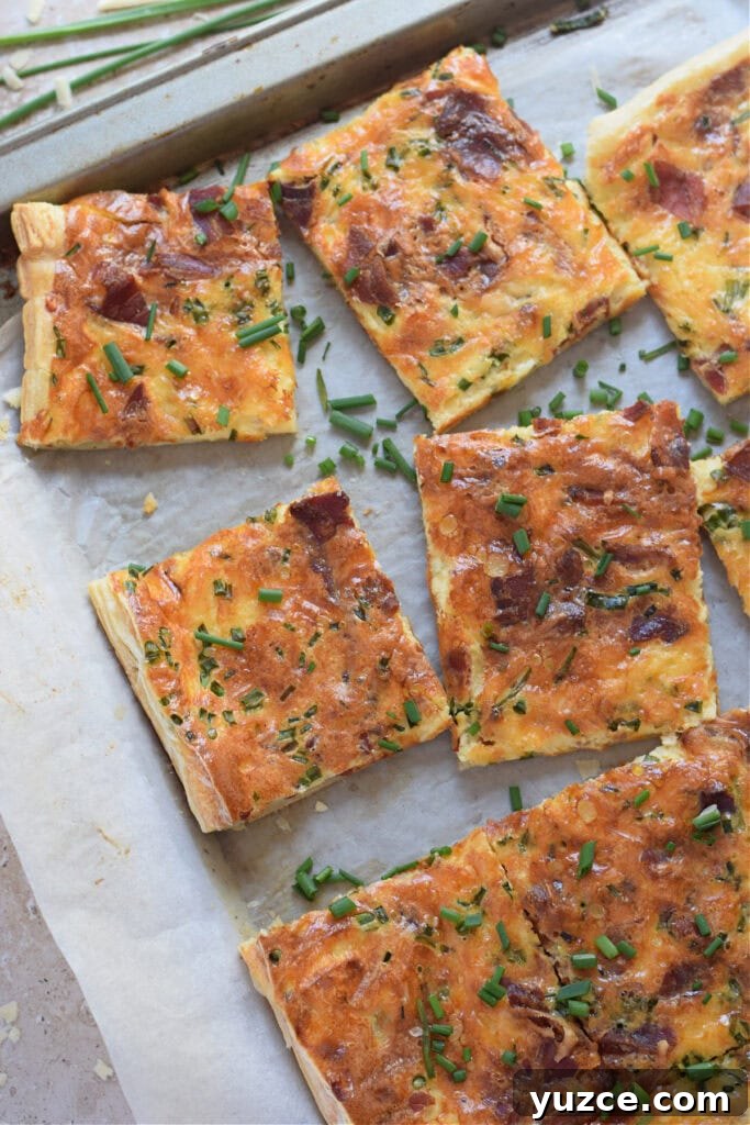 Flaky Puff Pastry Breakfast Quiche with Spinach and Cheese 14 Close up of breakfast sheet pan quiche.