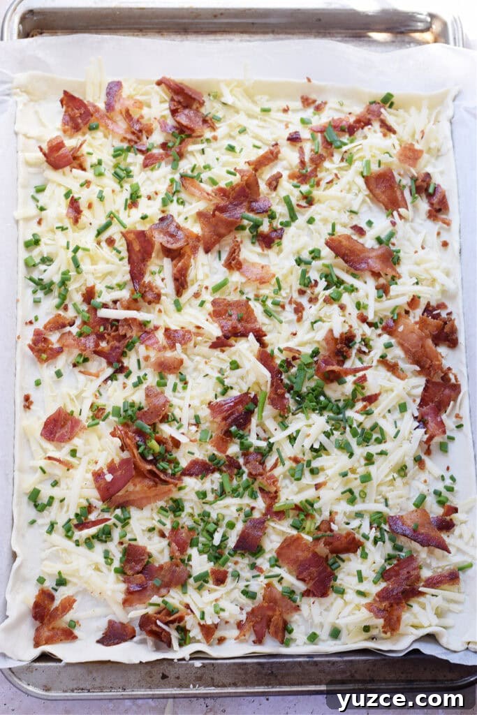 Flaky Puff Pastry Breakfast Quiche with Spinach and Cheese 8 Puff pastry with bacon, cheese and chives.