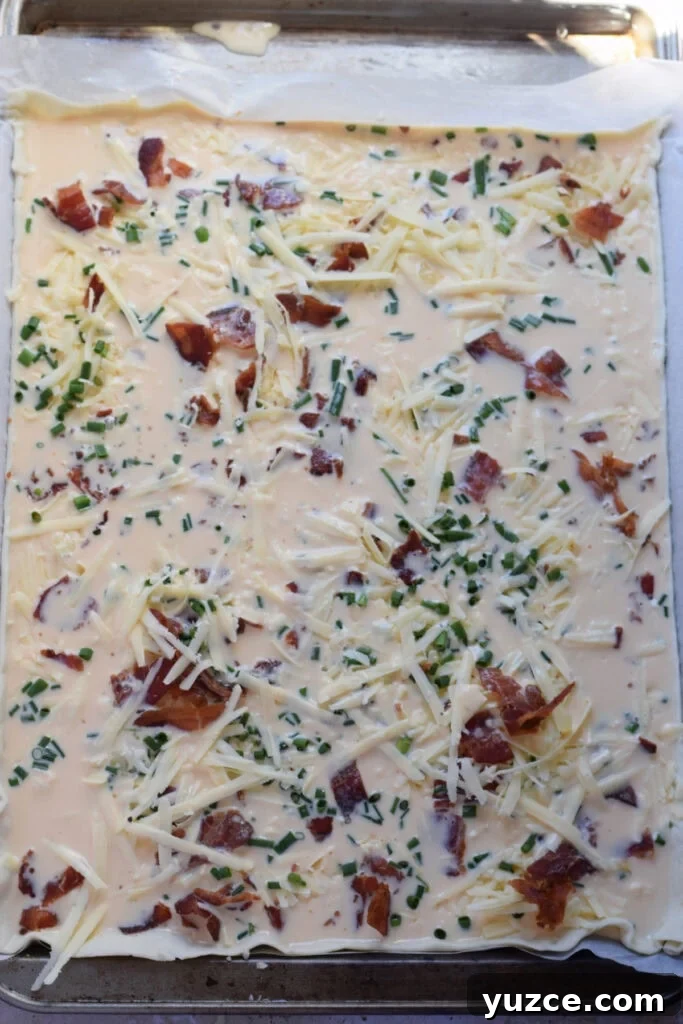 Flaky Puff Pastry Breakfast Quiche with Spinach and Cheese 9 Ready to bake sheet pan quiche.