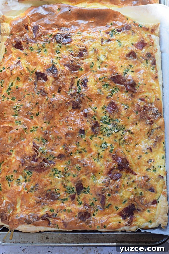 Flaky Puff Pastry Breakfast Quiche with Spinach and Cheese 10 Baked sheet pan quiche.