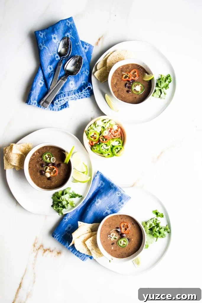 bowls of soup with colorful toppings