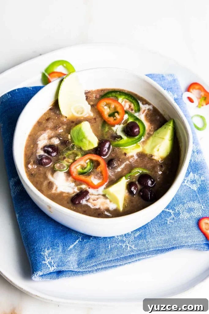 Black Bean Soup with avocado, jalapenos and scallions