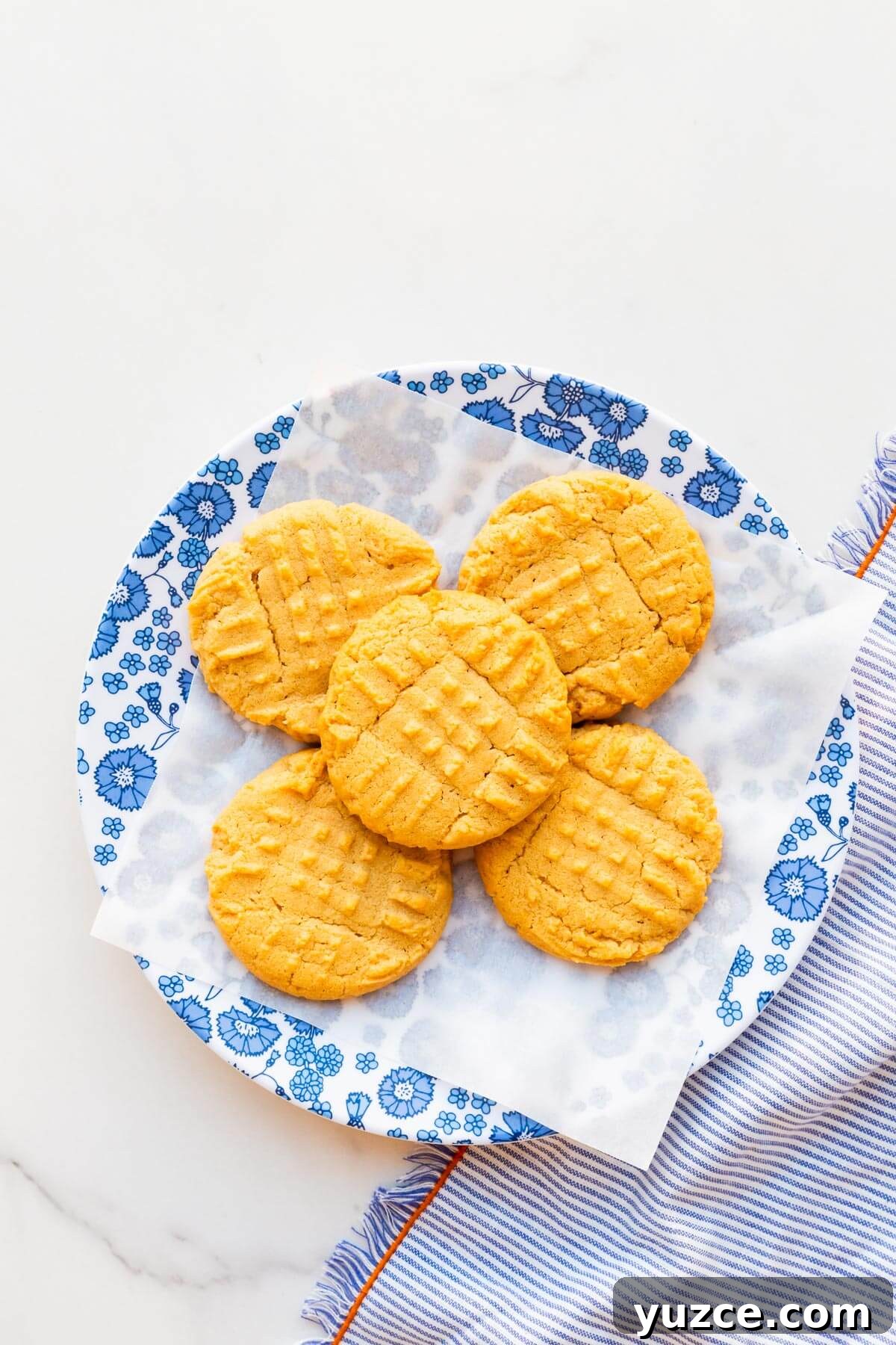 Classic Peanut Butter Cookies Made with Natural Peanut Butter 2 A plate of classic peanut butter cookies.