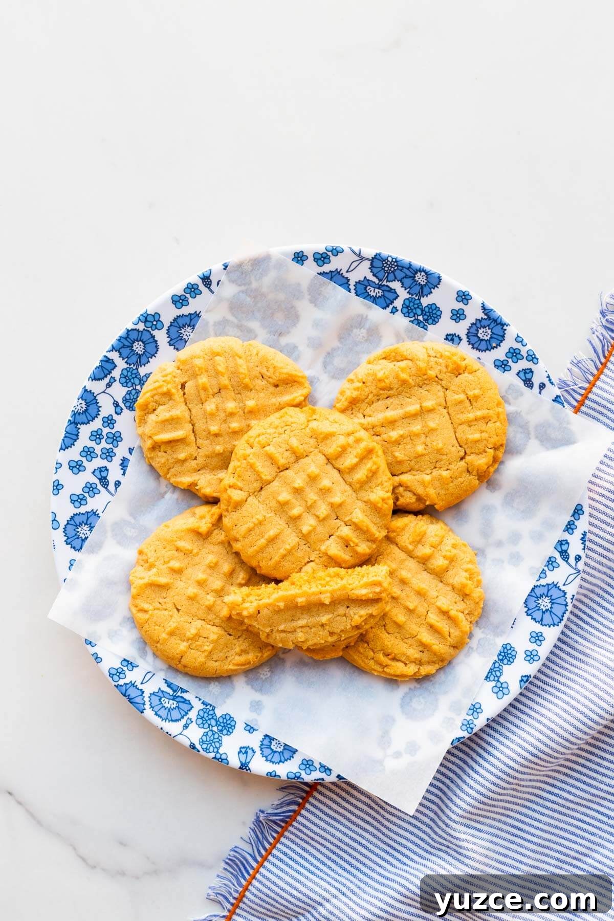 Classic Peanut Butter Cookies Made with Natural Peanut Butter 13 A plate of peanut butter cookies ready to be eaten.