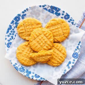 Classic Peanut Butter Cookies Made with Natural Peanut Butter 14 A plate of peanut butter cookies.