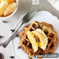 Orange Dark Chocolate Waffles with Zesty Orange Glaze 2 Recipe for orange and dark chocolate waffles. Made with white whole wheat flour and coconut oil! Filled with orange zest and chopped dark chocolate!