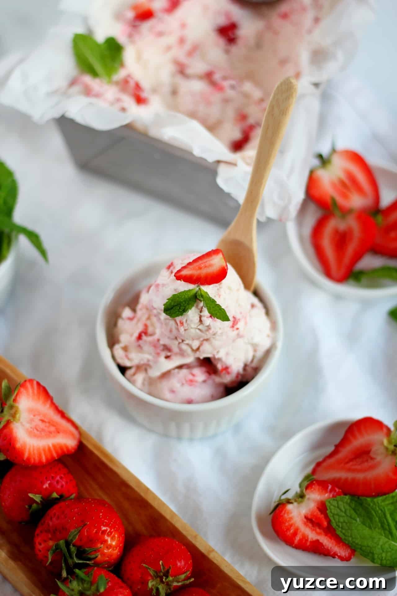 No-Churn Fresh Strawberry Ice Cream Recipe 6 strawberry ice cream scooped in white bowl