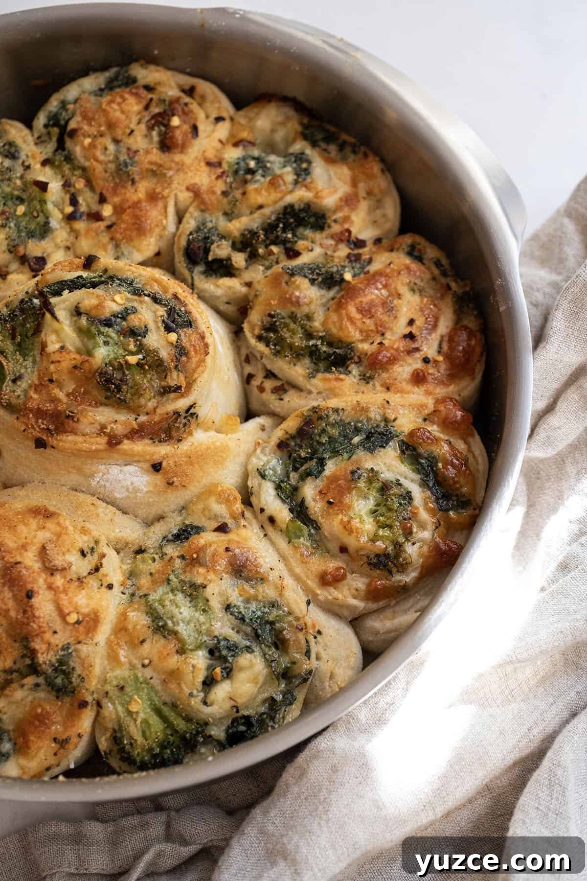 Vegetable Stromboli Recipe: Flavorful Homemade Stromboli Guide 2 Veggie pinwheels baked in a cake pan.