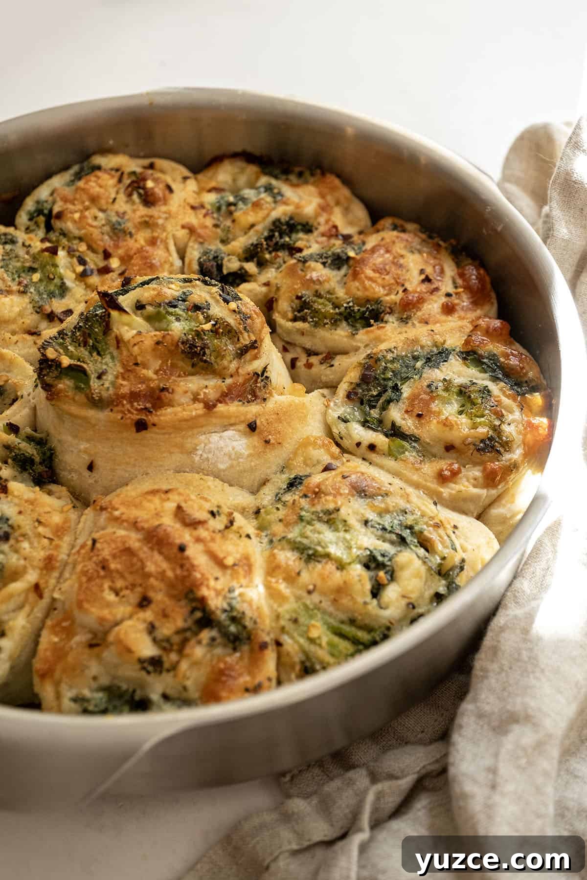 Vegetable Stromboli Recipe: Flavorful Homemade Stromboli Guide 10 Veggie pinwheels baked in a cake pan.