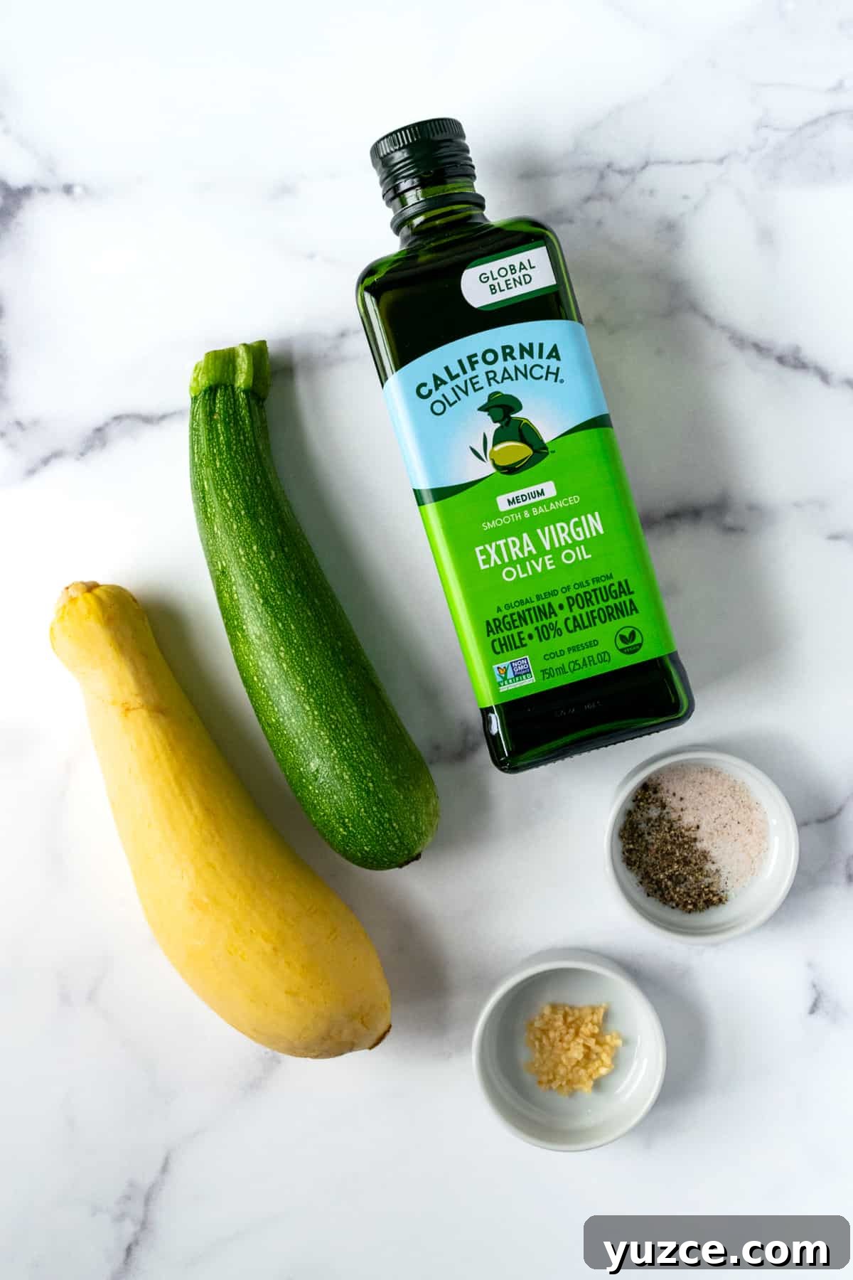 Crispy Air Fryer Zucchini & Summer Squash Recipe 3 Ingredients on a countertop to make zucchini and squash in the air fryer.