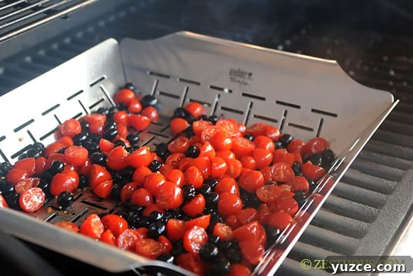 basket of tomatoes and blueberries.