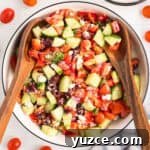 A large bowl of colorful Greek salad