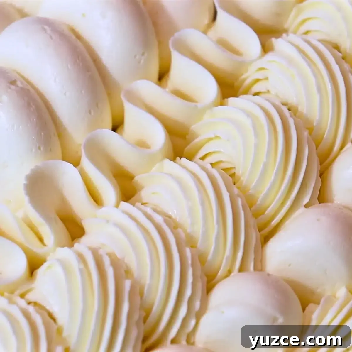 Luscious Lemon Buttercream Frosting Recipe for Cakes and Cupcakes 20 piped lemon frosting
