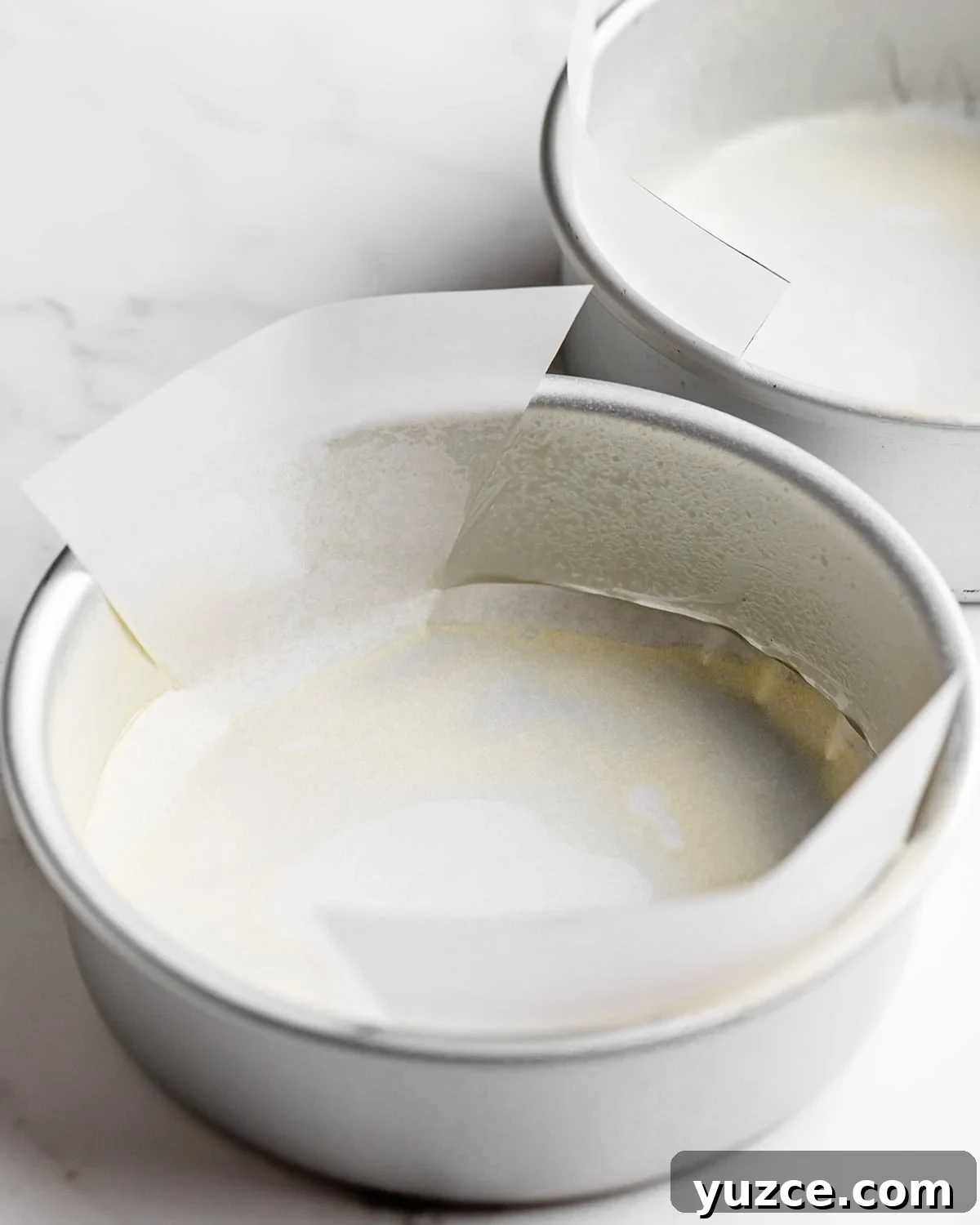 Moist Coconut Layer Cake Recipe 6 two pans lined and greased to make Coconut Cake
