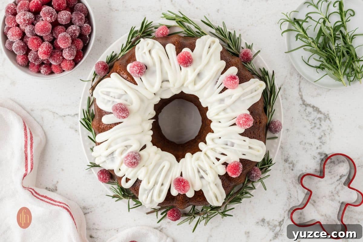 bundt gingerbread cake on a white plate.