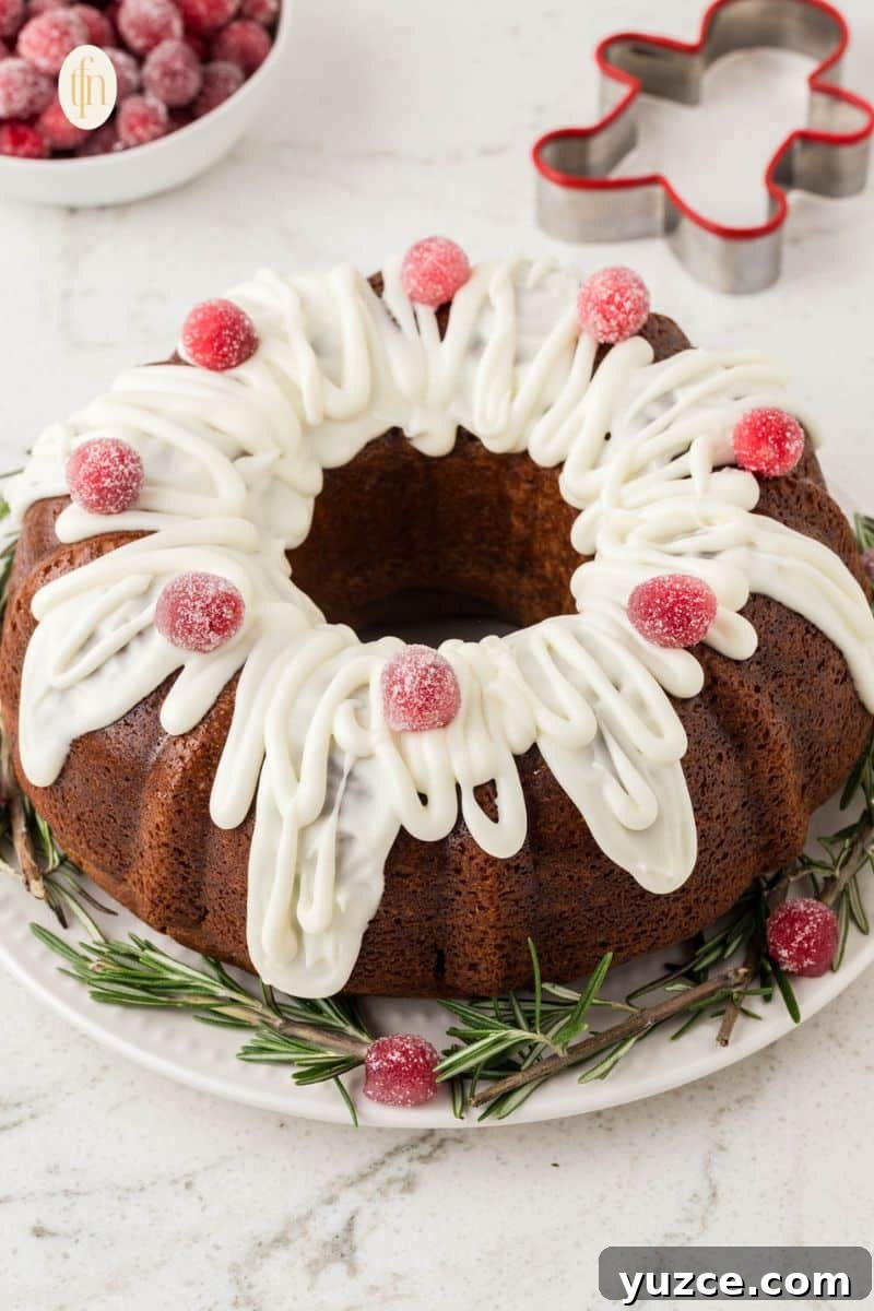 bundt gingerbread cake on a white plate.