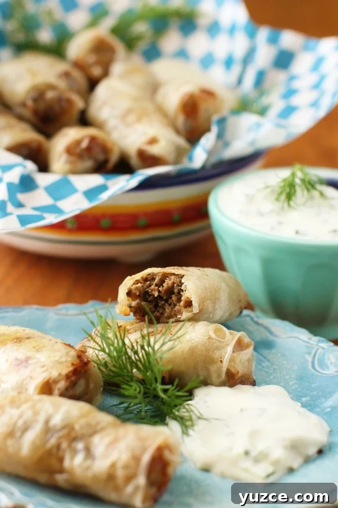 Gluten-Free Beef Sausage Rolls with Creamy Tzatziki Dip 2 Baked gluten free sausage rolls with Tzatziki
